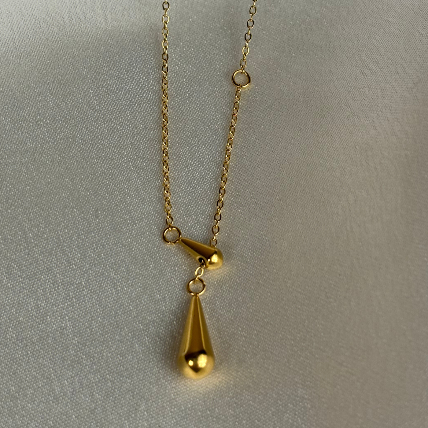 Gold-tone Teardrop Pendant Necklace.