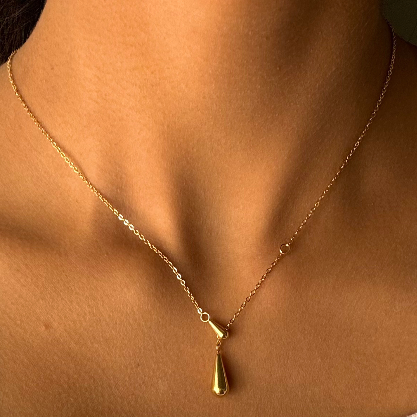 Gold-tone Teardrop Pendant Necklace.