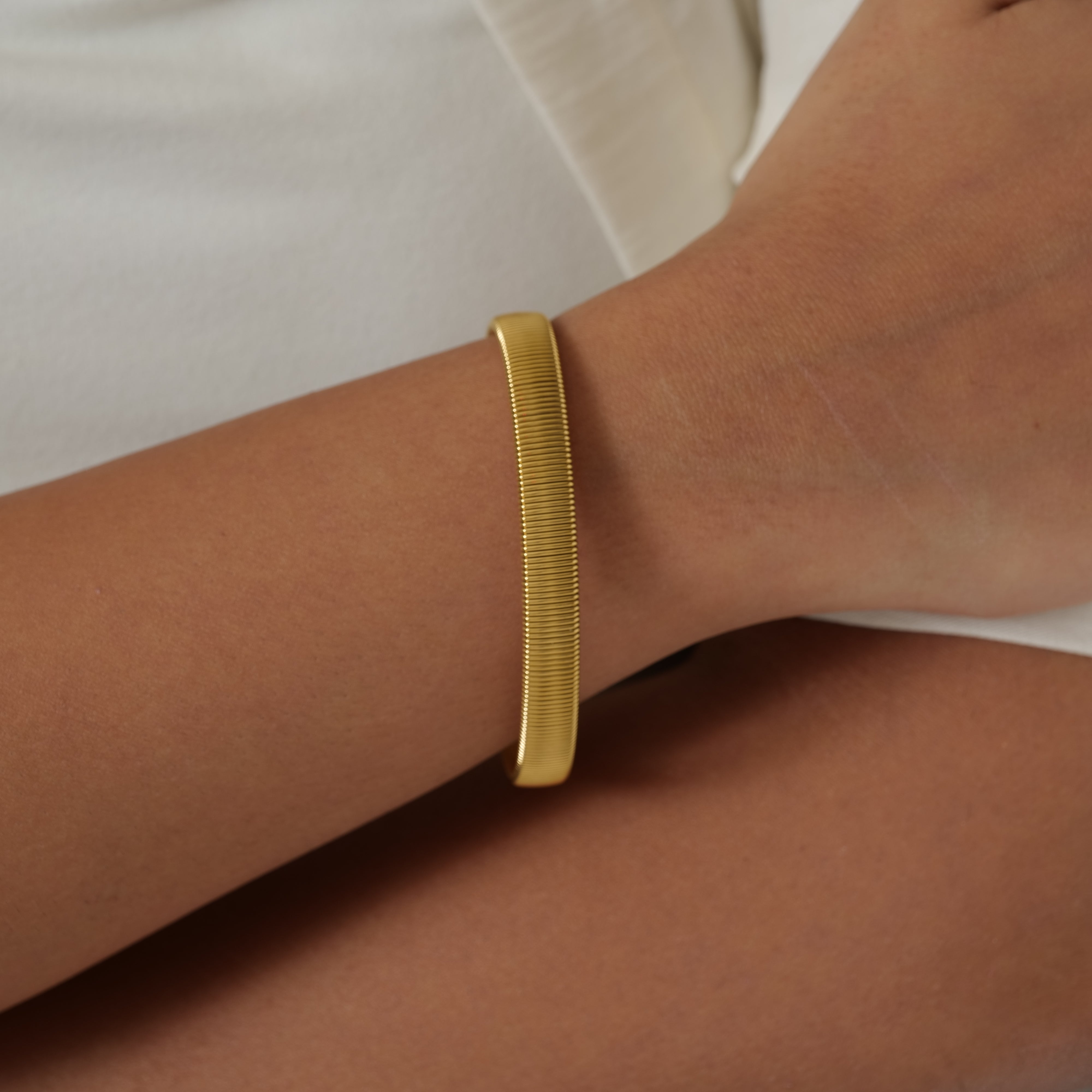 Gold coil cuff bracelet