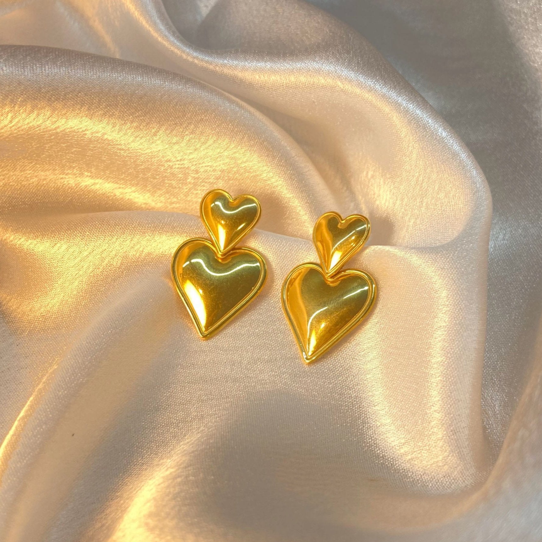Heart-to-Heart Gold Plated Statement Earrings
