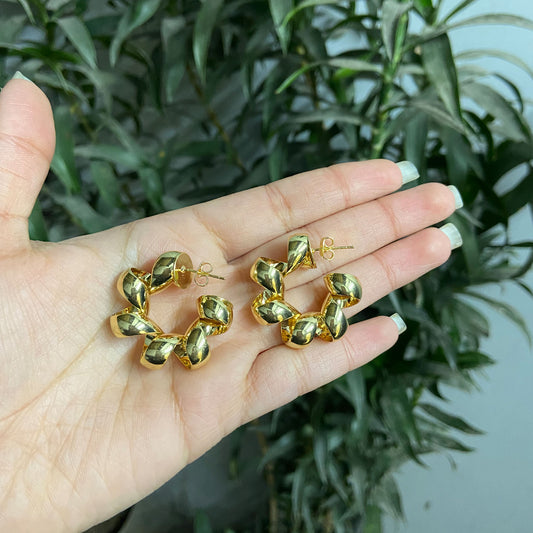 Swirling Gold plated C-
hoops