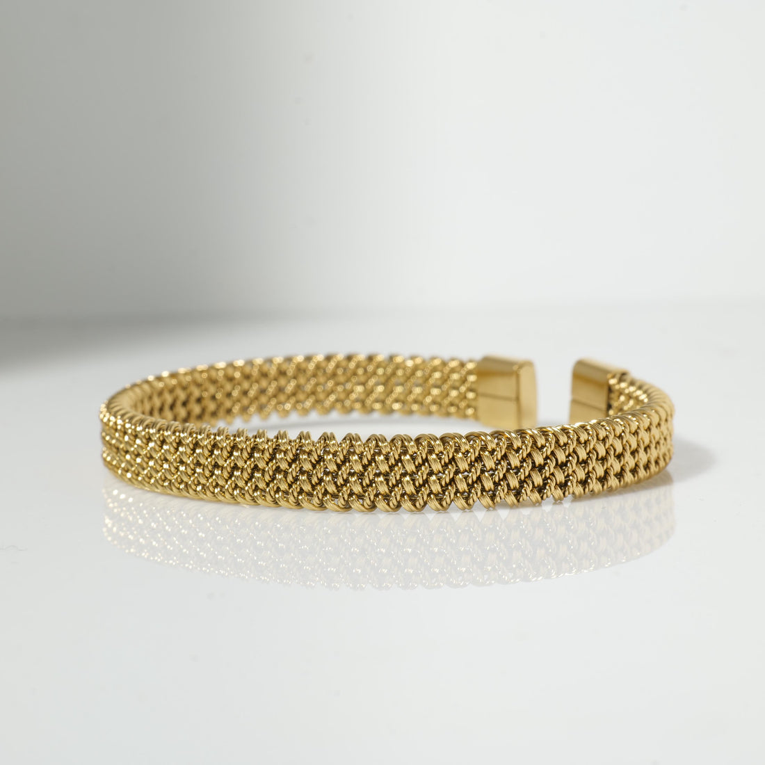 Gold braided cuff bracelet