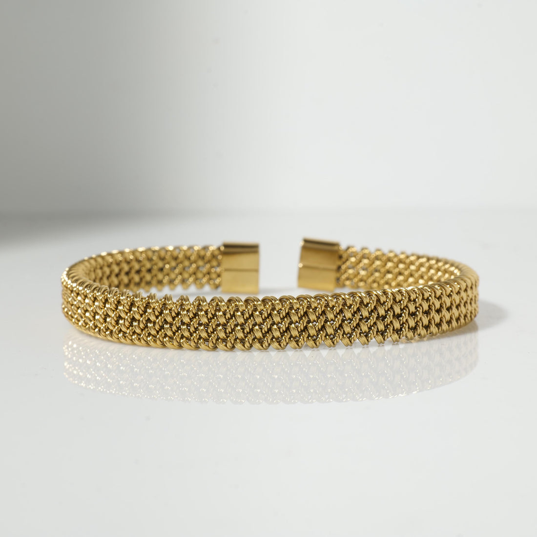 Gold braided cuff bracelet