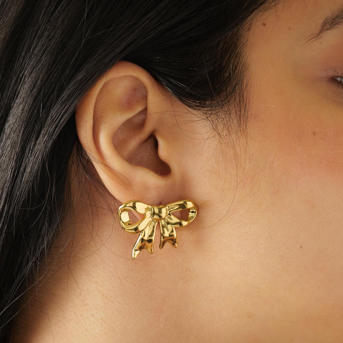 Gold ribbon bow earrings