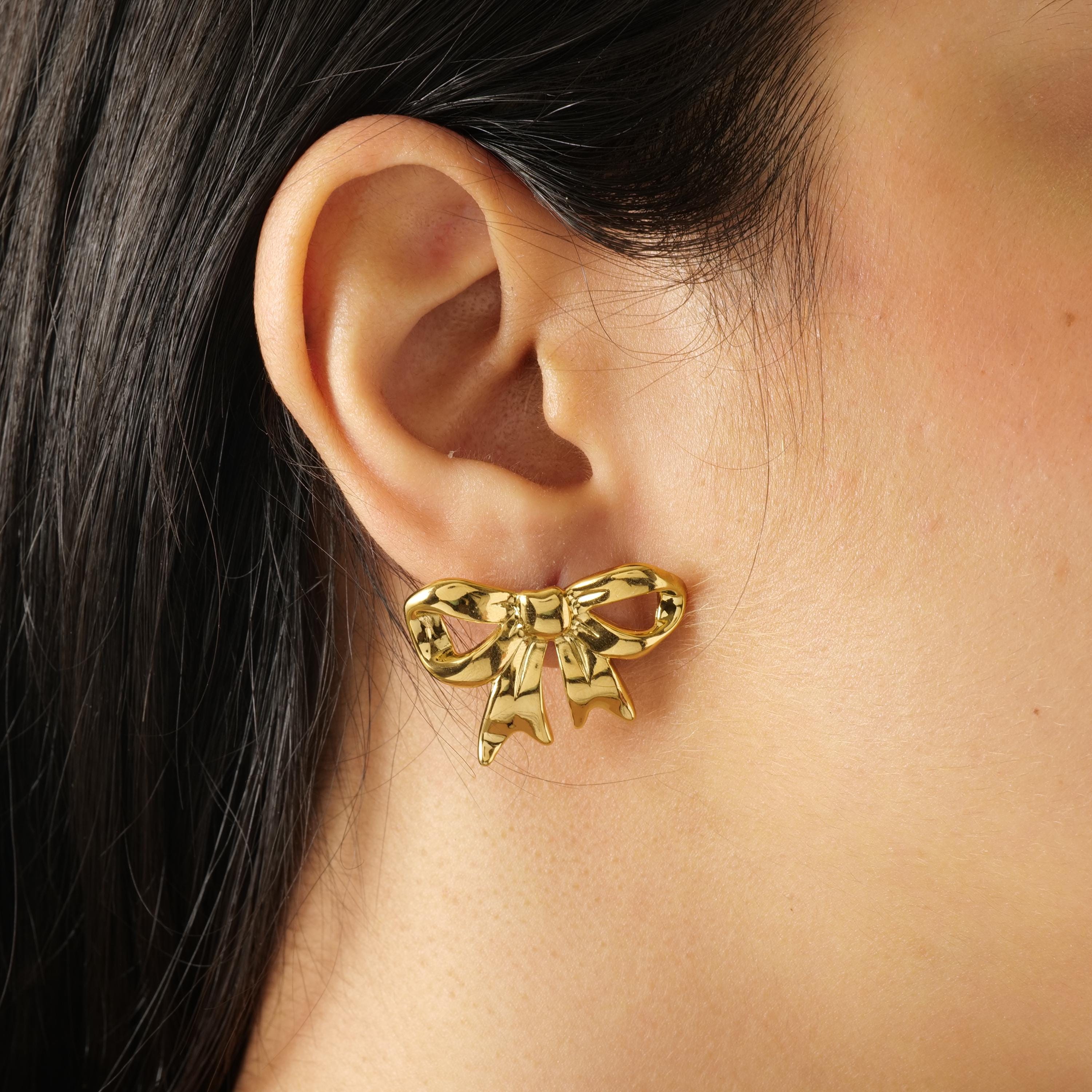 Gold ribbon bow earrings