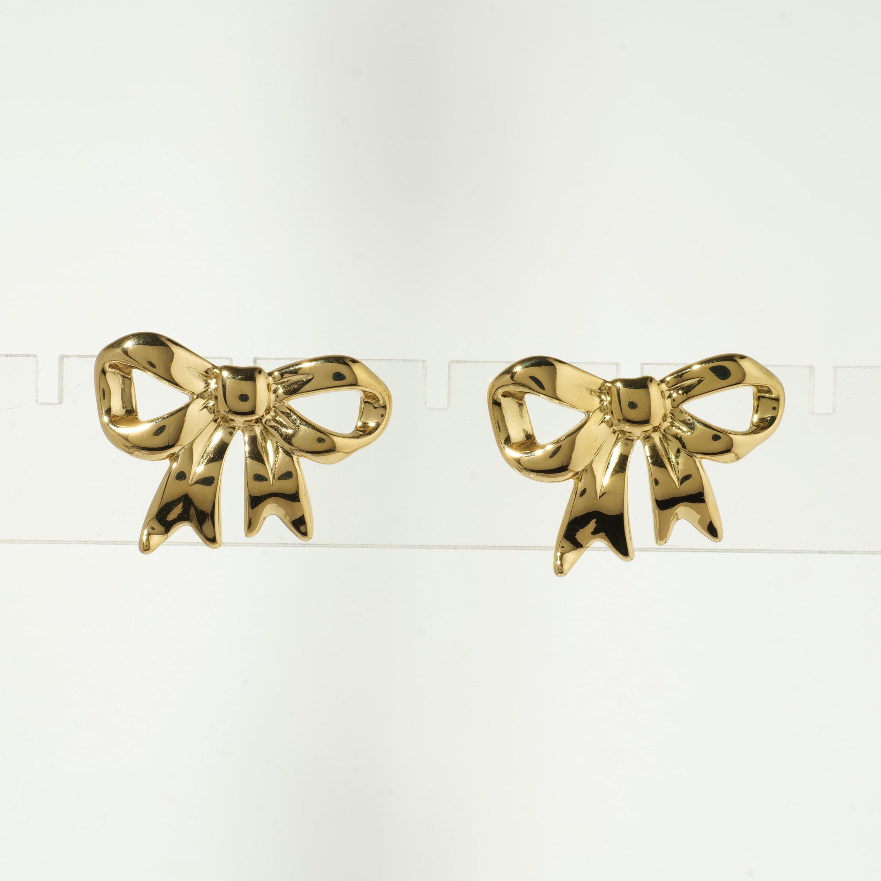 Gold ribbon bow earrings