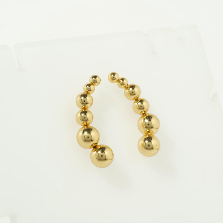 Gold bubble hoop earrings