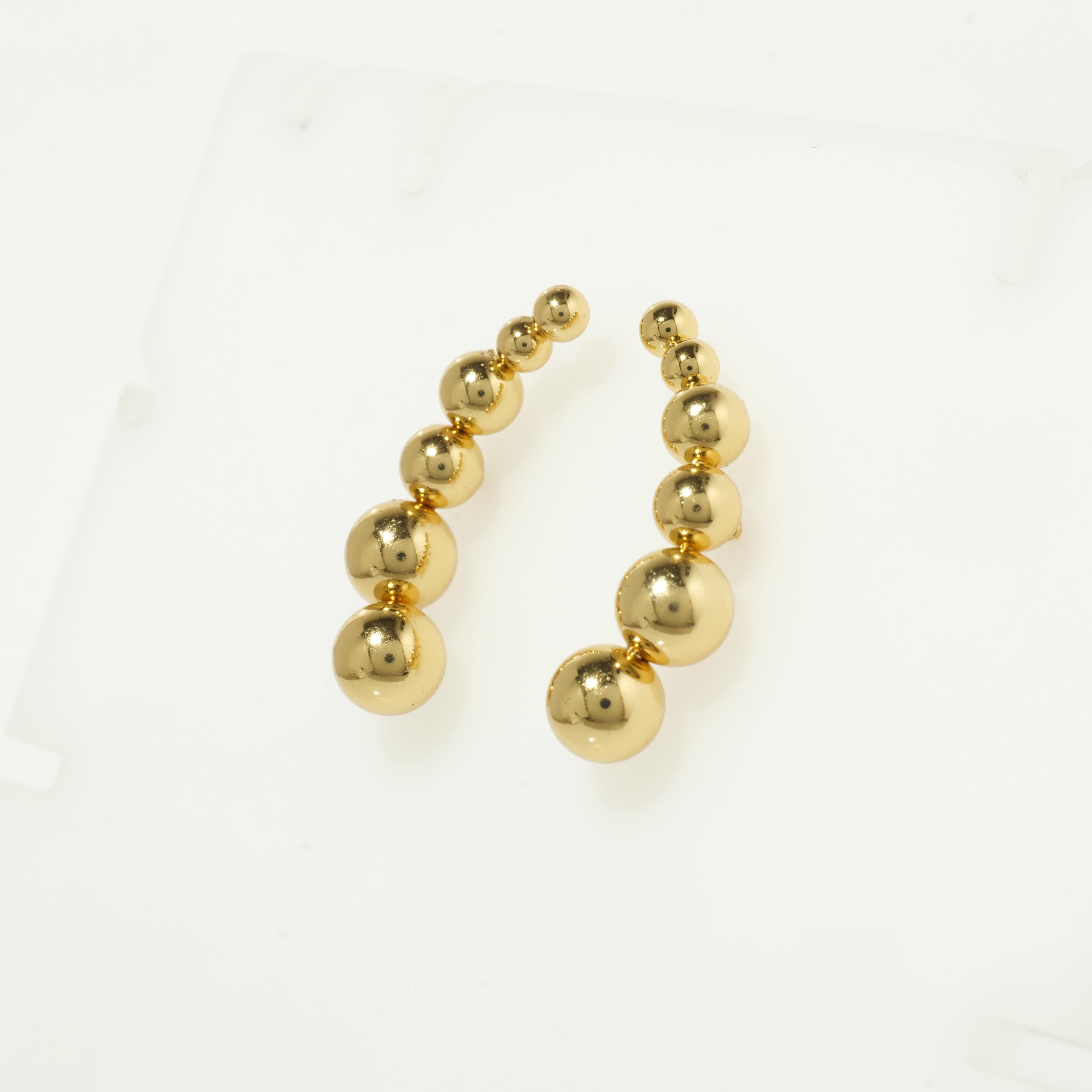 Gold bubble hoop earrings