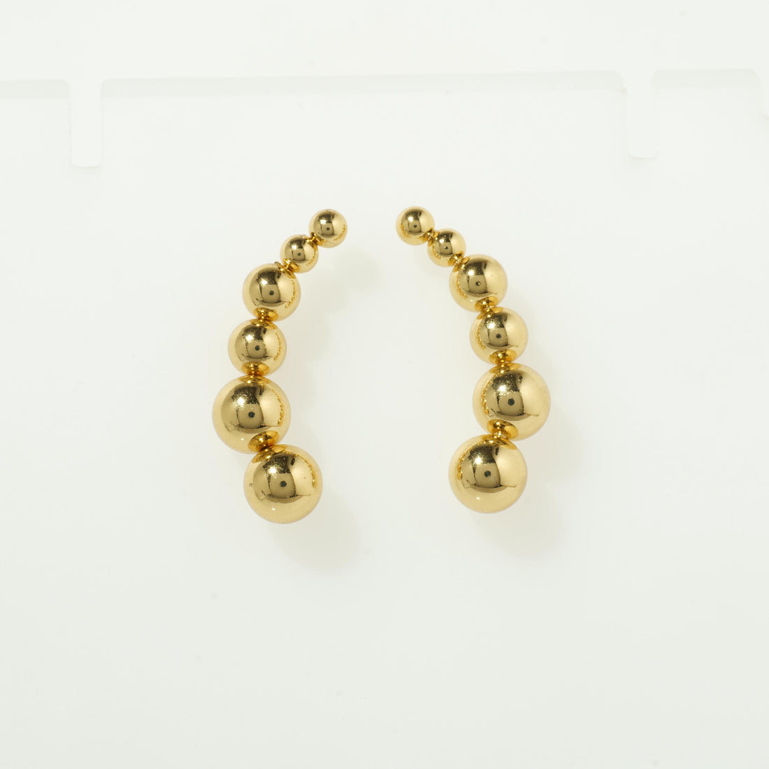 Gold bubble hoop earrings