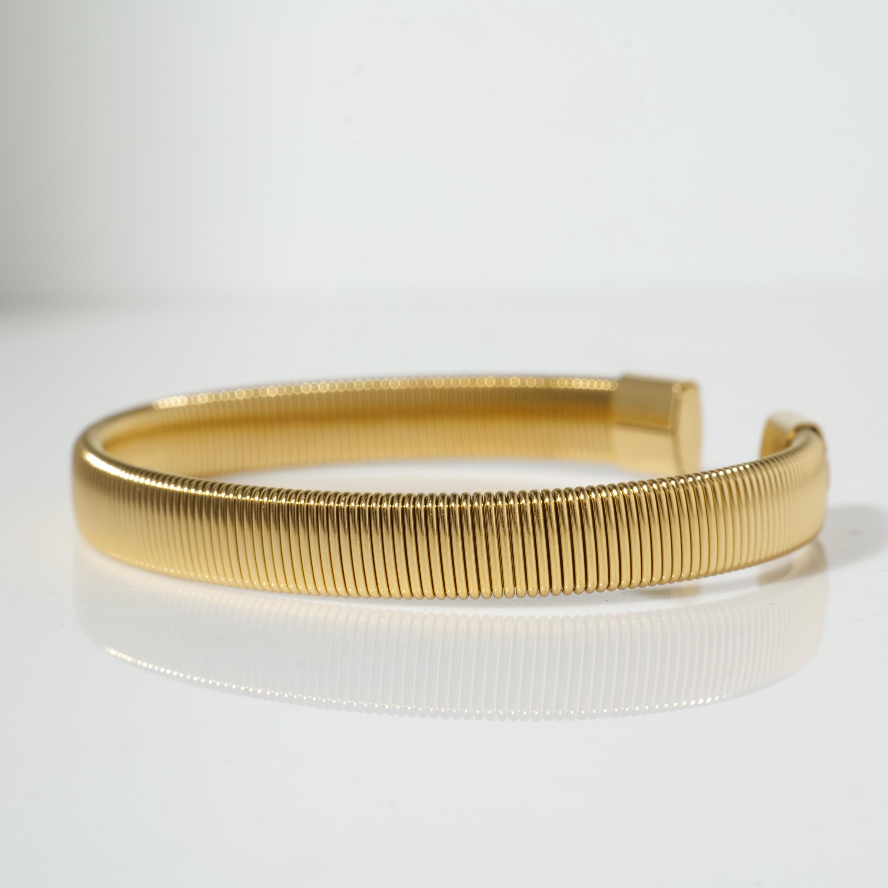 Gold coil cuff bracelet