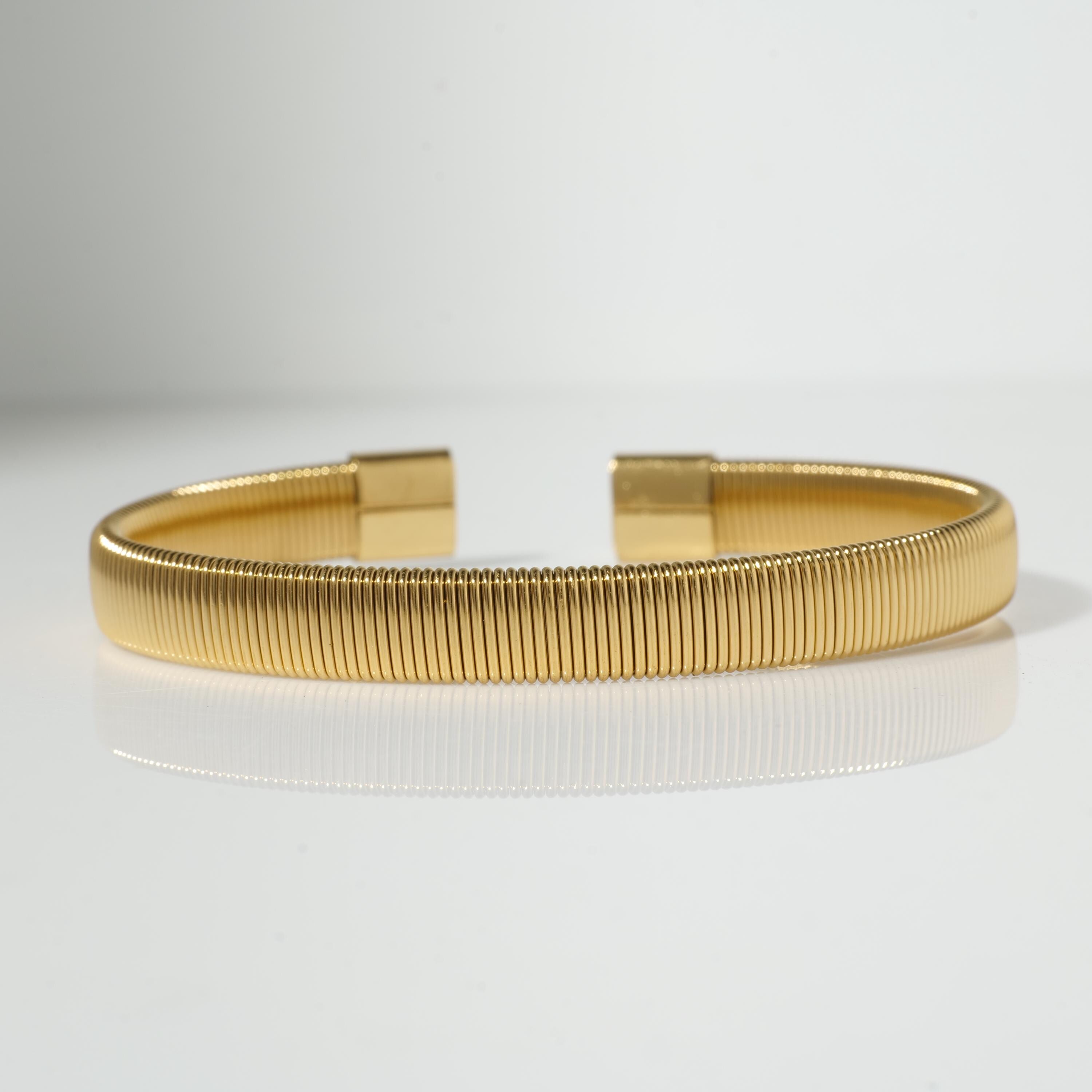 Gold coil cuff bracelet