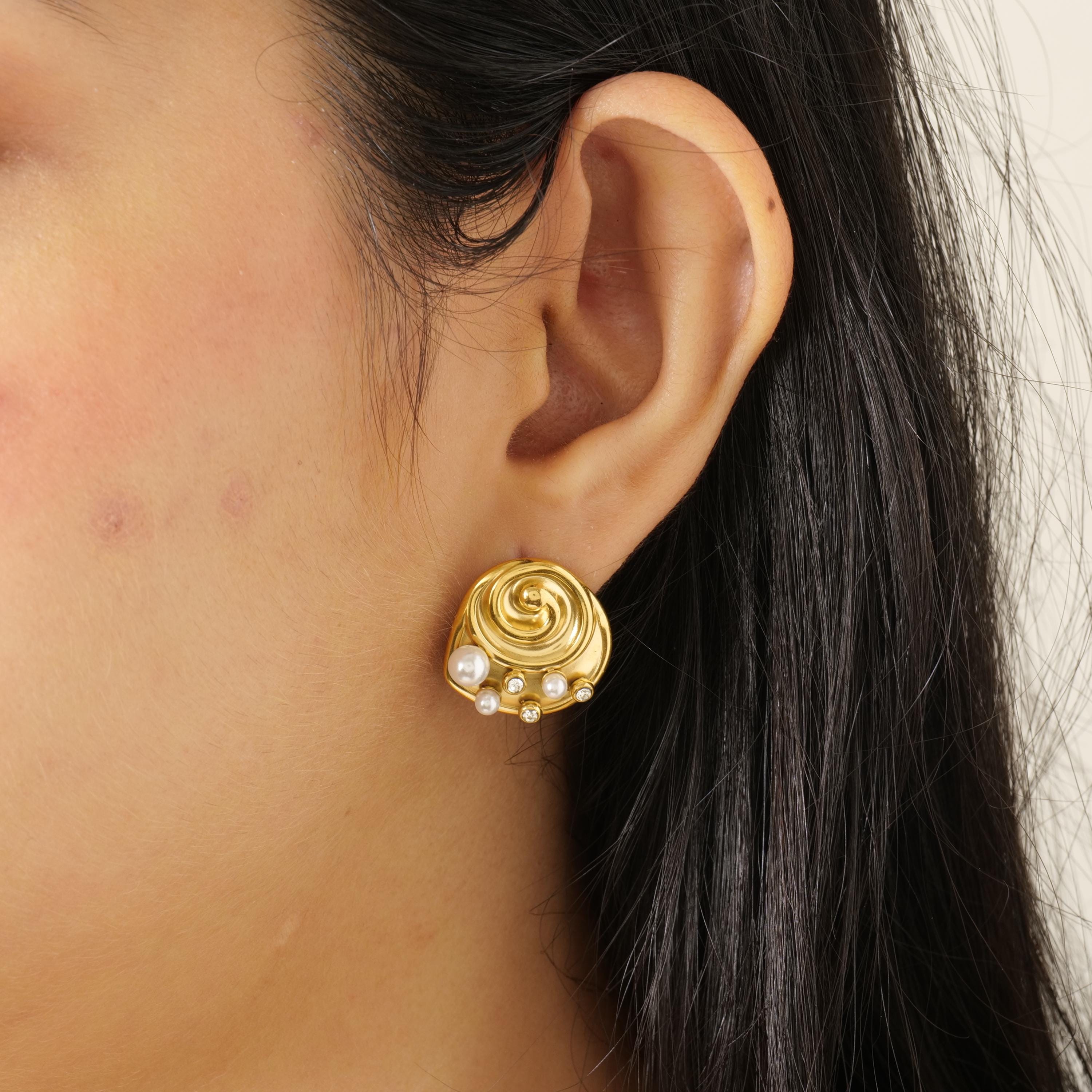 Gold swirl pearl stud earrings